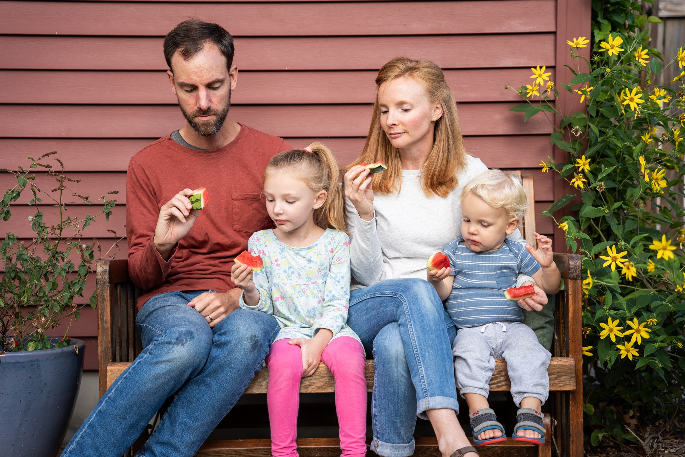 A family embracing the joy of summer in a heartwarming at-home photo session.