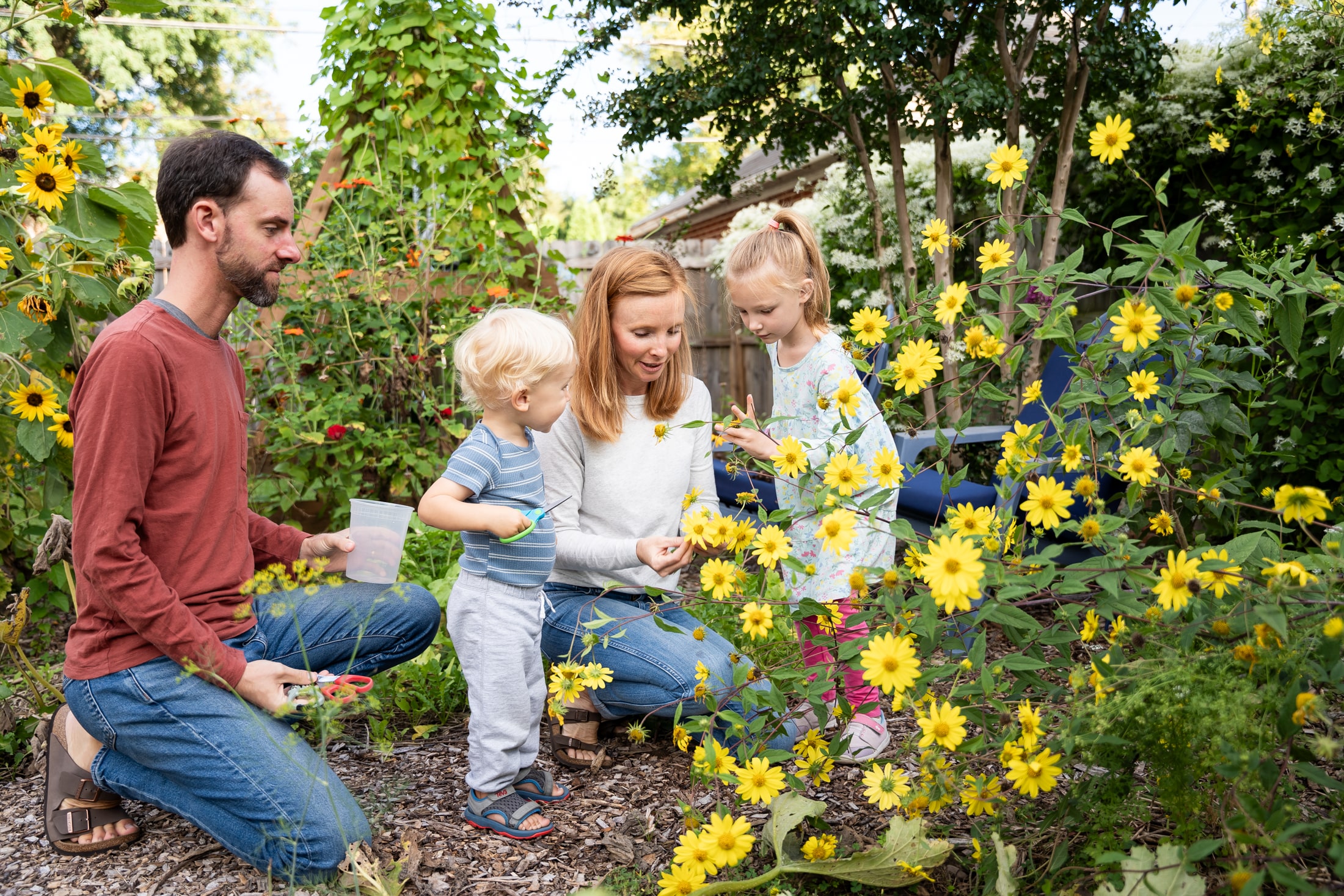 A floral ear-dornment adds whimsical fun to Jancey's at-home family photos