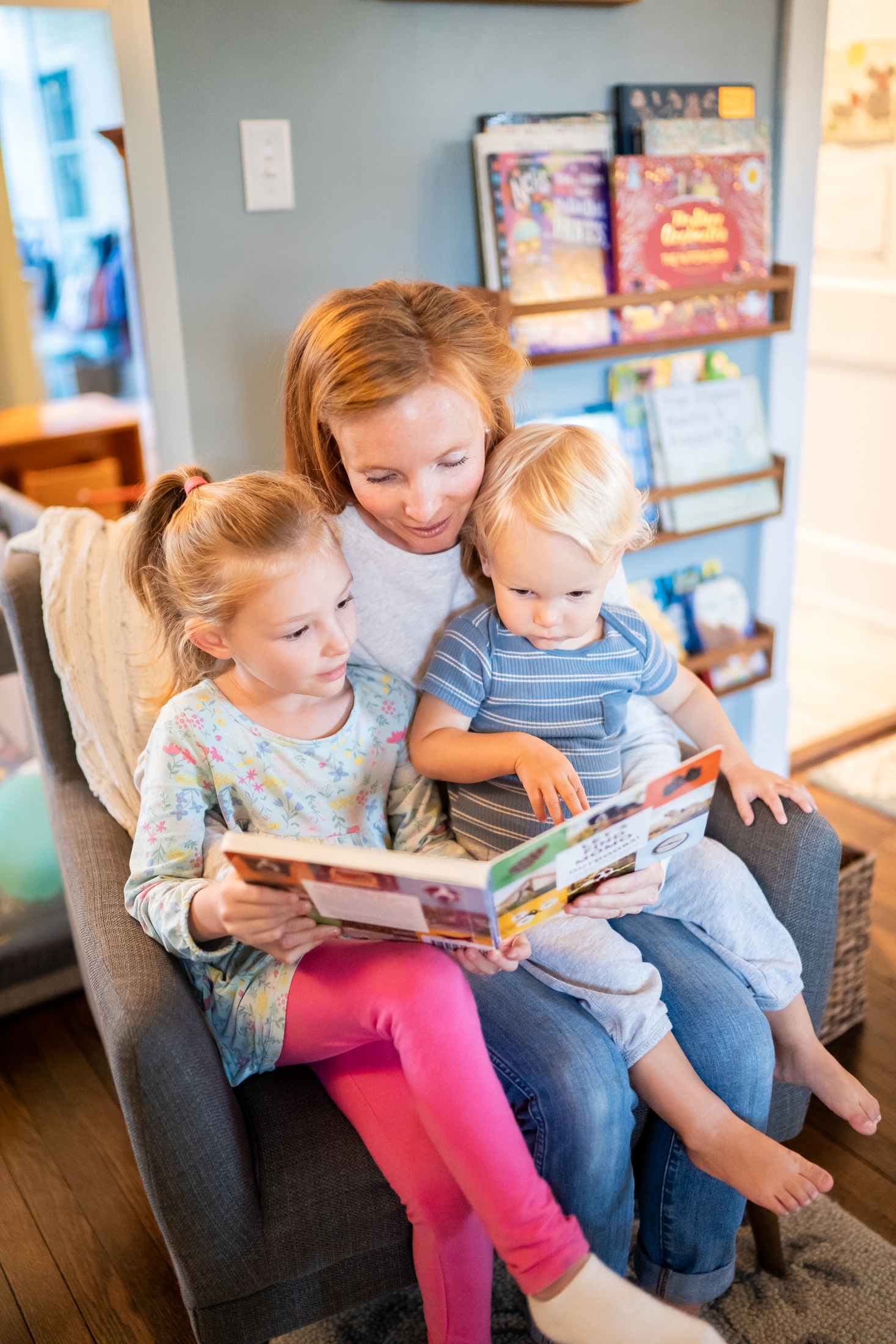 Cozy reading nook: A heartwarming moment of family bonding during story time.