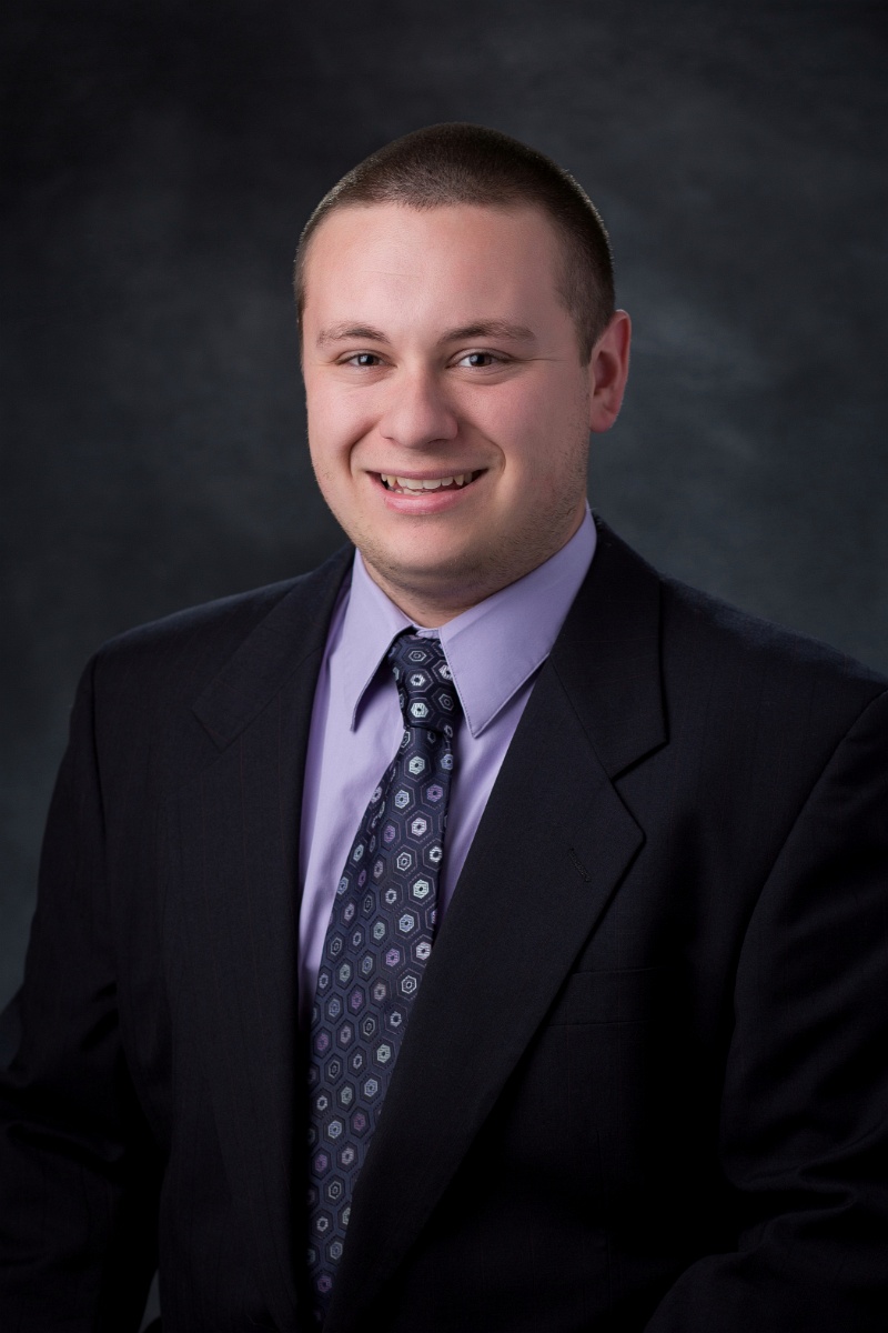 a professional business posing for a traditional headshot