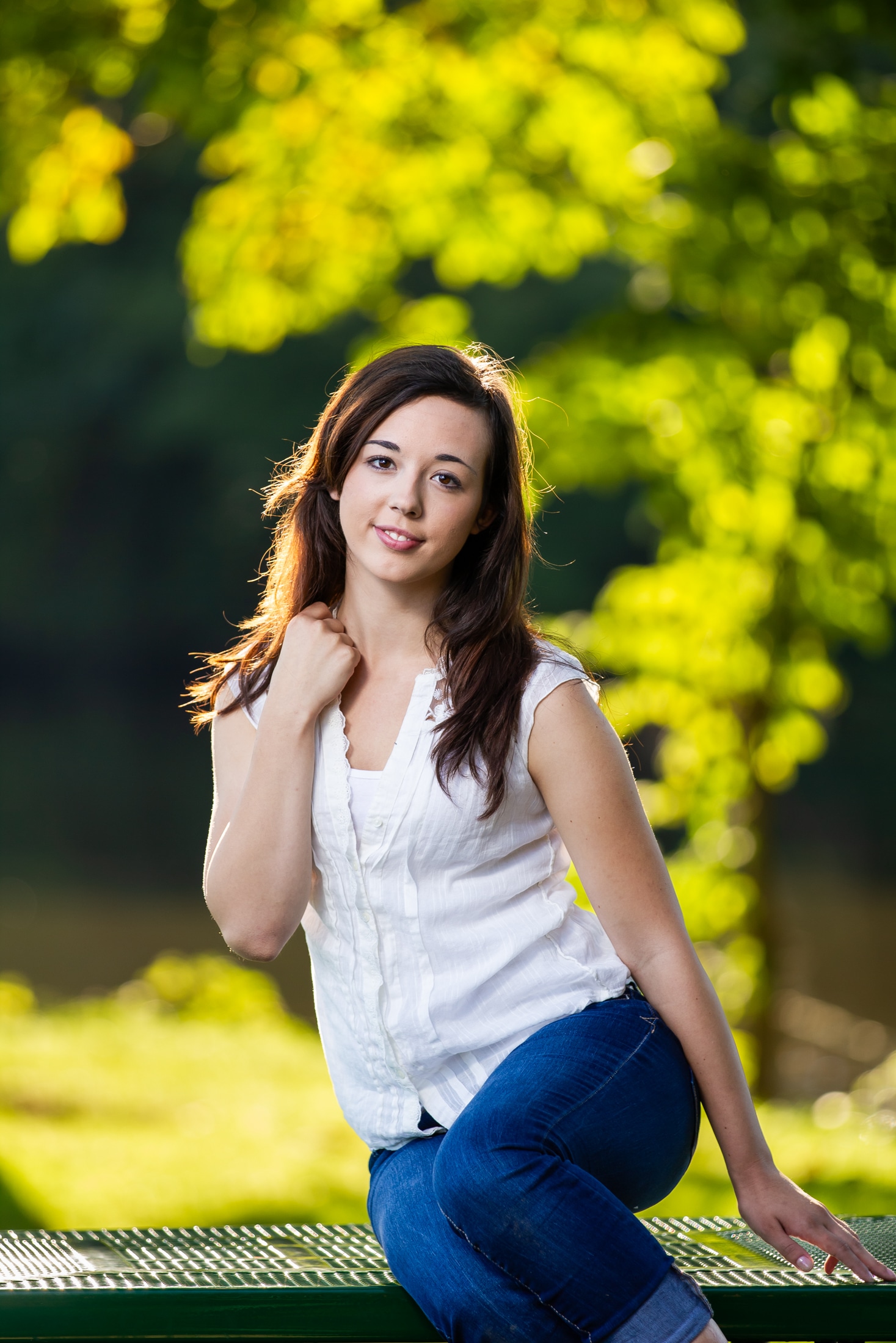 Streamside dreams: A candid portrait of Chelsea reflecting near the tranquil waters.