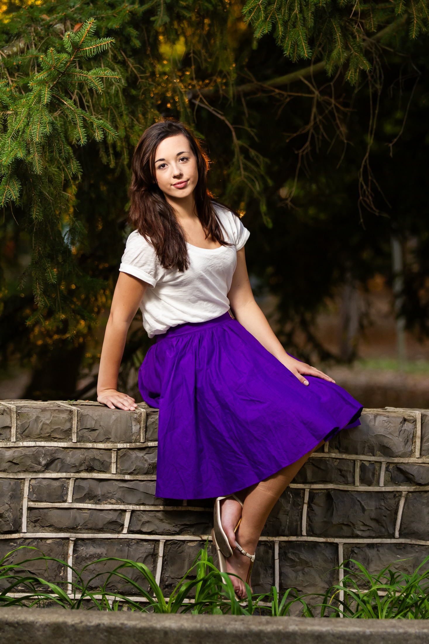 Senior girl leaning and looks dreamy